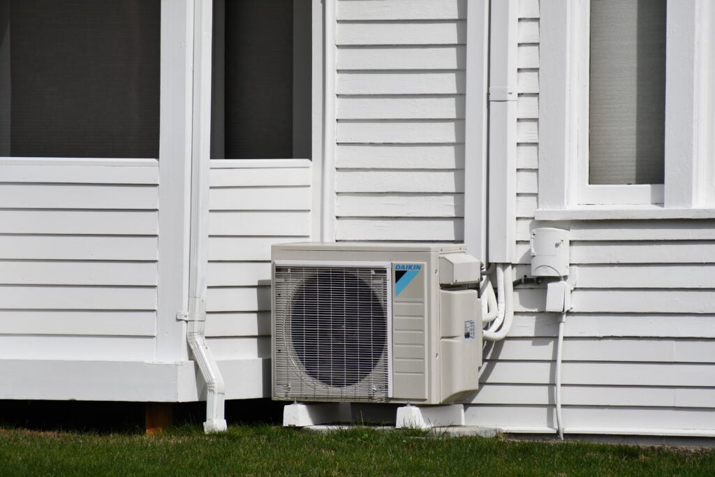 is daikin a good brand hvac outside of house white siding