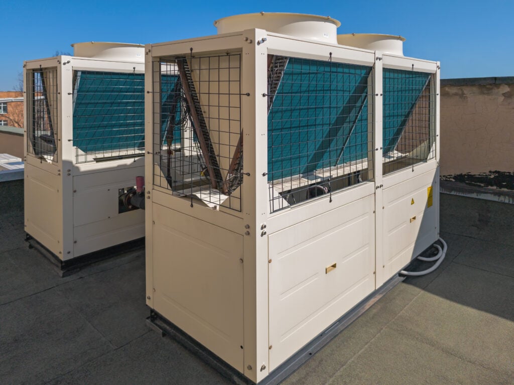 evaporative cooling Large outdoor HVAC unit mounted on a rooftop, designed for cooling and ventilation in commercial complex. Module cold and hot water unit is high-efficiency environmentally friendly air-conditioning